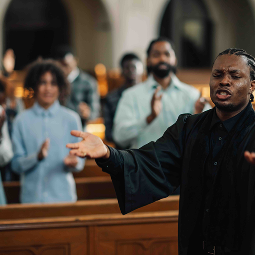 african-american-priest-leading-congregation-in-pr-2025-03-30-22-32-29-utc